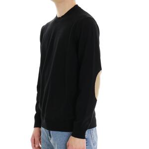 MAGLIA CON TOPPE NERO